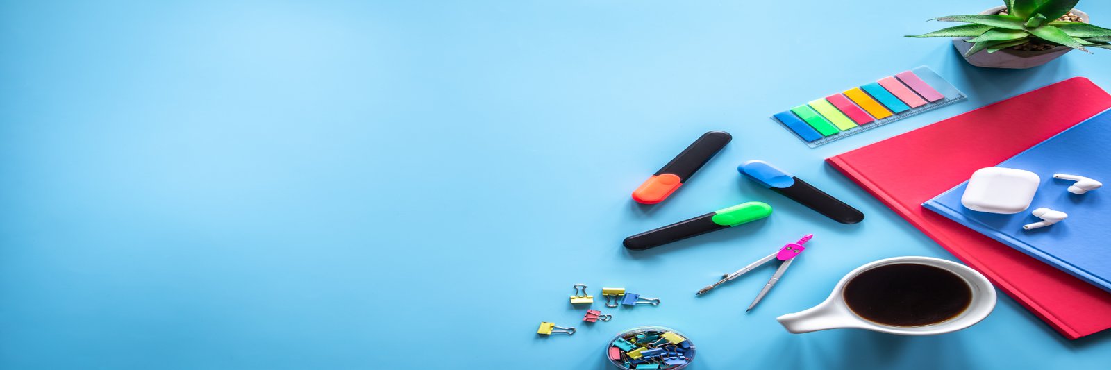 Flat lay with stationery items, pupil and student workplace concept.